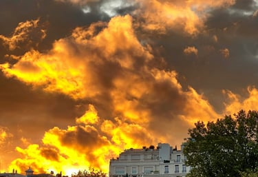 a building  with an orange cloudy sky