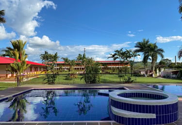 a pool with a pool and a fenced in area