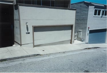 Weather damaged garage door in San Francisco.