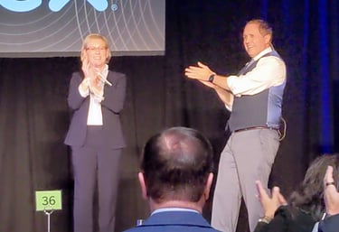 San Jose mentalist David Martinez performs on stage at a corporate event.