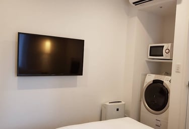 Hotel room with washer and dryer