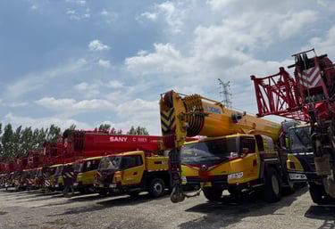 a crane is parked in a lot with many other cranes