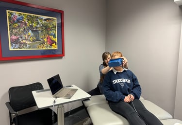 Dr. Jen Sharma helps a patient with vertigo