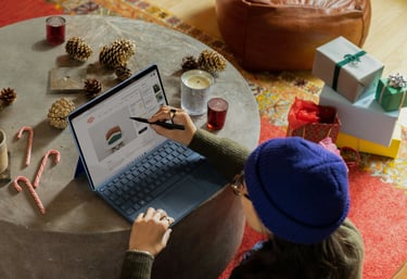 Consumer advice and product reviews shown on a laptop while holiday shopping at home with gifts, can