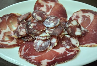 Lactose-free menu - Traditional Sardinian food: artisanal cured meats at Agrisole near Olbia.