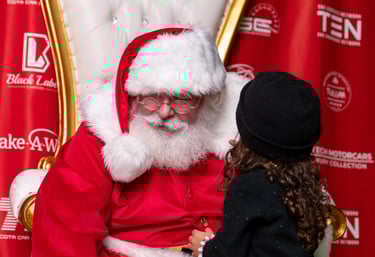 The Santa Cowboy listens to a childs special needs