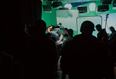 Production team in the process of setting up a shot on the set of Lupe Q Corn Cake