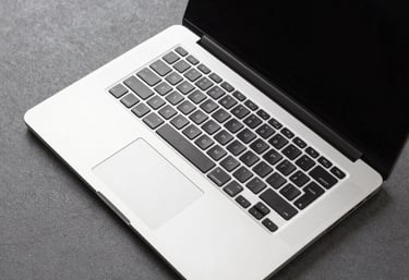 Detailed close up of laptop, make it from top angle, fully opened, and give elegant accent