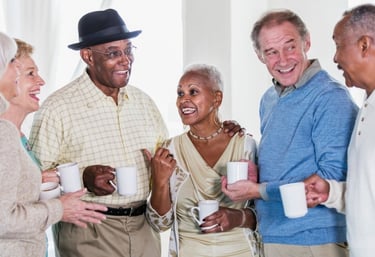 group of seniors having coffee together