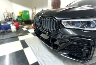 mobile detailing of luxury black bmw suv