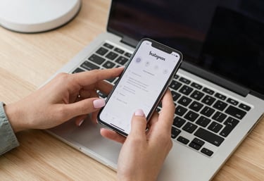 A calm workspace with a smartphone showing social media apps on the screen.