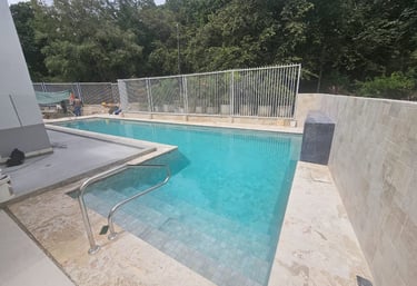 Piscina de concreto en diseño de L by Summer Pool Solutions