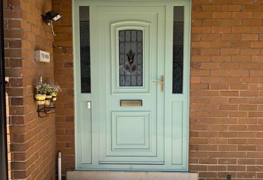Blackpool PVC door painted in pastel green