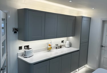 Blackpool Kitchen fitted with grey cupboards and white quartz worktop
