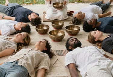 A serene room with crystal singing bowls arranged for a sound healing session.