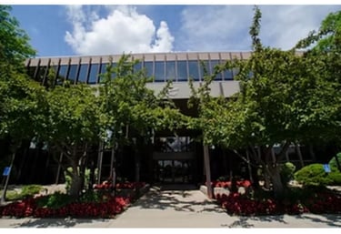 Front exterior of the office building, showing the entrance and structure where the clinic is located.
