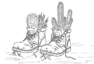 Two worn work boots with prickly cacti growing out of them, symbolizing resilience and harsh environments.