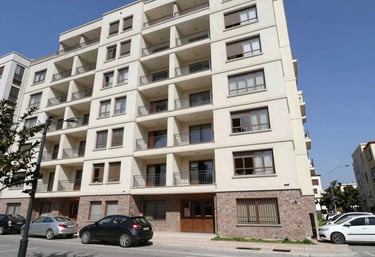 Modern real estate office with team members collaborating and welcoming clients warmly
