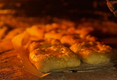 História e tradição da Pizzaria Caraíva no Prior Velho em Lisboa, destacando o fabrico próprio e qua