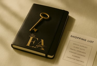 A premium, matte black leather notebook sitting on a textured white linen surface. 