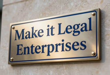 A close-up of a high-end metal nameplate on a marble wall that says 'Make it Legal Enterprises', reflecting a royal blue and gold luxury branding.