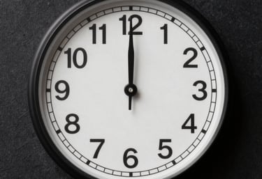 a man riding a skateboard down a street next to tall buildings