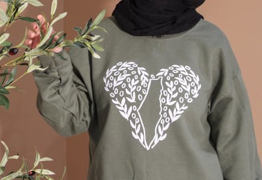 model wearing green sweatshirt 