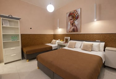 camera tripla comfort ciro marina letto queen e letto singolo il vicoletto bnb