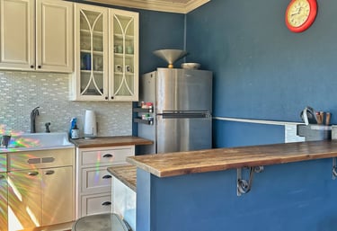 kitchen with fridge and cabinets 2123 rivermont apartments