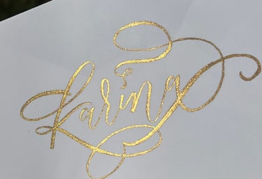 gold foil type custom calligraphy envelope "Karina" with flourishes