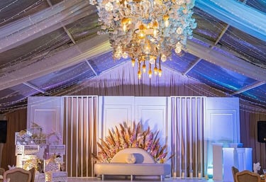 a wedding reception table with a throne throne and throne
