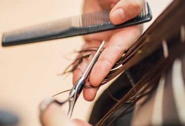 Hair cutting service at Just Teasin salon