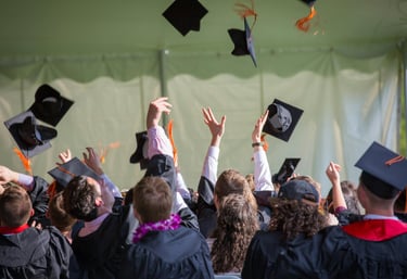 a few students at a graduation ceremony