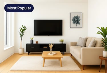 A stylish living room with a sofa, coffee table, and armchairs.