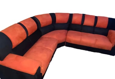 a couch with a black and orange couch and a black and white couch