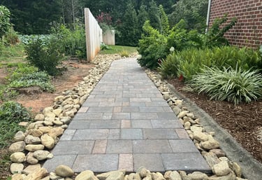 Custom paver walkway by Storm Valley Landscape, enhancing residential curb appeal with professional 