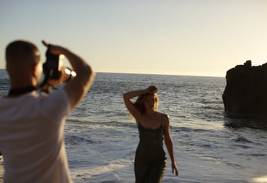 Photographer Mihail Zhelezniak photographing on Praia Formosa Beach