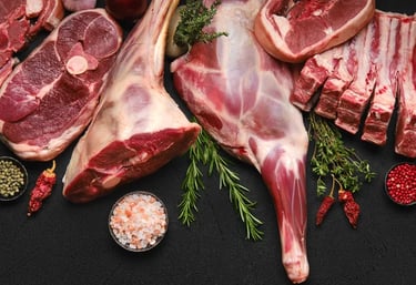 raw meat on a table with spices and spices