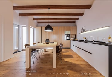 a kitchen with a table and chairs and a table
