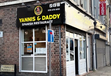a Spanish restaurant situate on Grange Terrance with a sign that says Yannis & Daddy