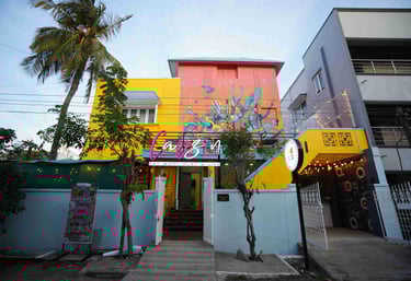 a colorful building with graffiti on the building facade.