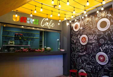 a cafe with a chalkboard wall mural
