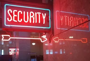 Neon “Security” sign glowing in red, symbolizing Binance’s top-tier security features like SAFU fund