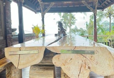 Outdoor Joglo living space built with antique teak wood offering natural ventilation and elegant tropical ambiance