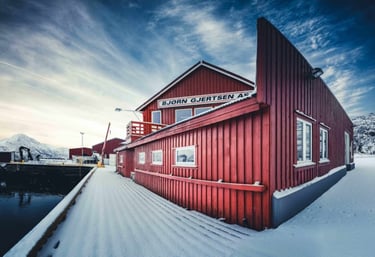 Winter view of Bjørn Gjertsen fish warehouse in Reine, Lofoten– part of the local fishing heritage