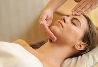 a woman getting a  facial deep skin cleaning  at a spa