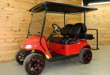 Red 2-seater golf cart for hire