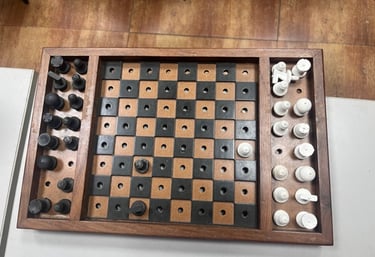 A chess board with tactile pieces 