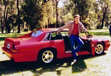 Peter Pickering at Perry Lakes in Perth, having restored his red Jaguar XJS V12