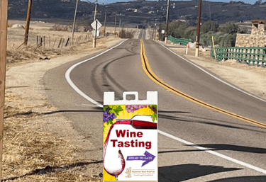 wine tasting sign to the winery